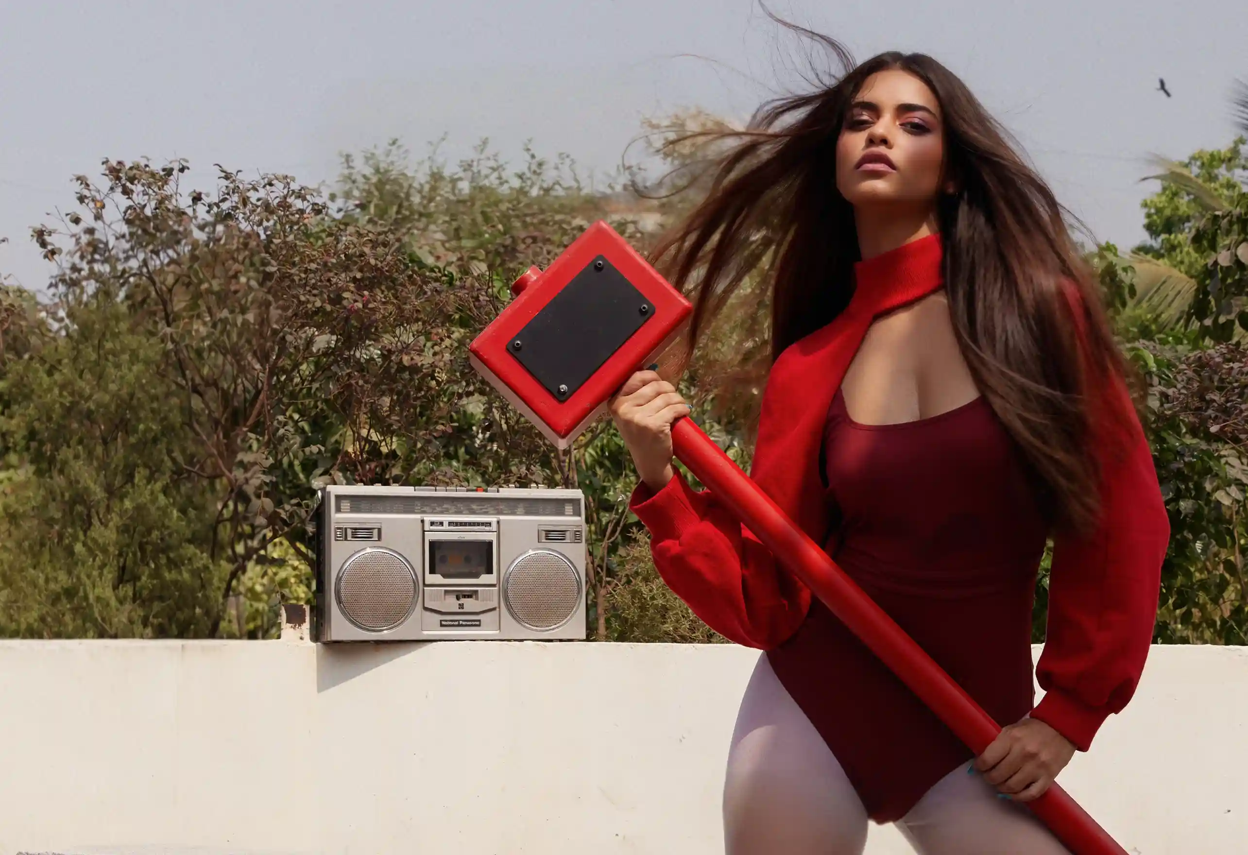 Fashion model with  voluminous long hair showcasing editorial styling by Florian Hurel Hair Couture